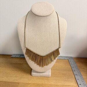 Gold tone bar accent chunky geometric fringe bib necklace
